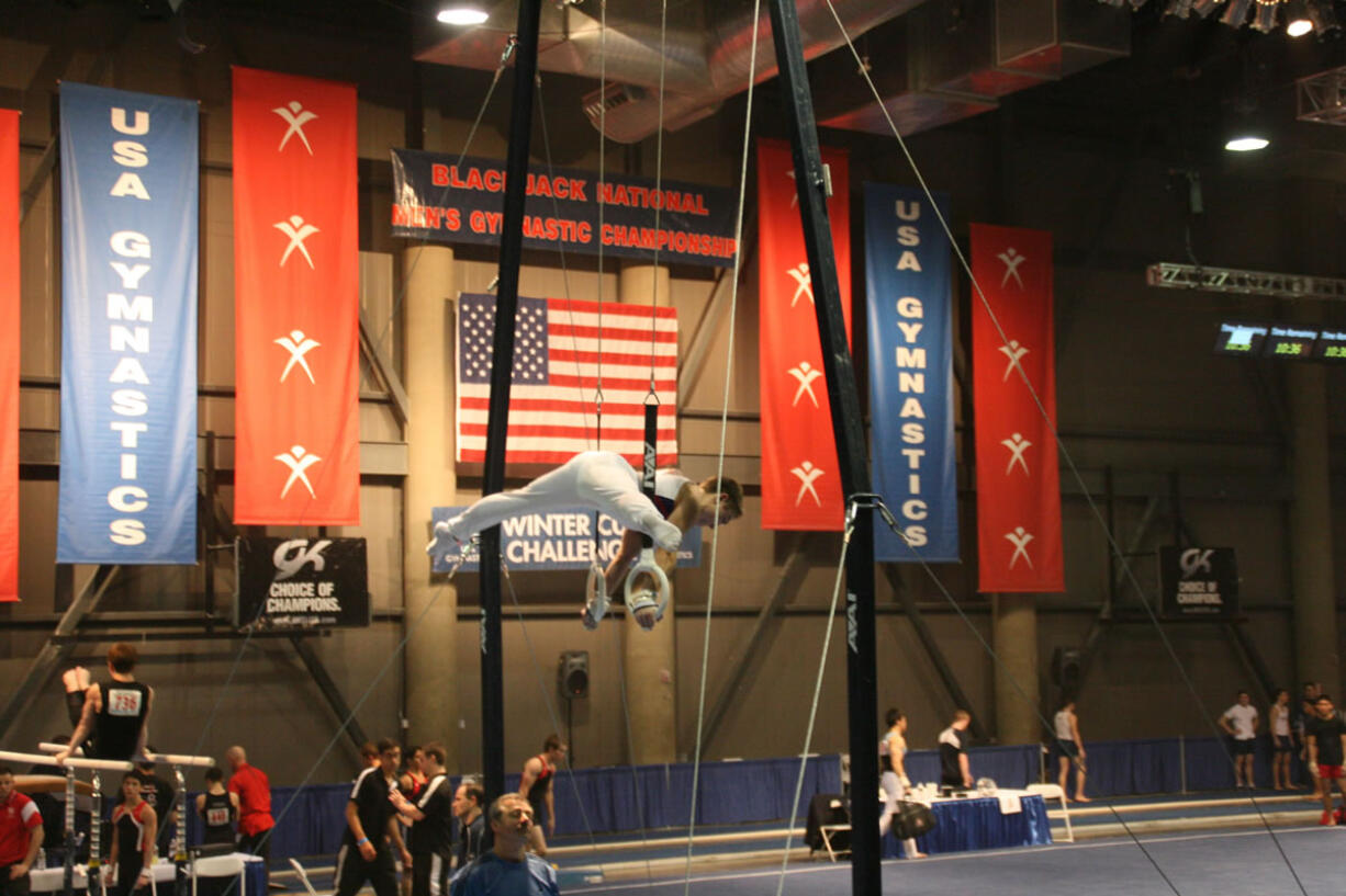 Nick McAfee performs on the rings during the Blackjack National Men's Gymnastics Championship Feb. 3, in Las Vegas.