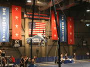 Nick McAfee performs on the rings during the Blackjack National Men's Gymnastics Championship Feb. 3, in Las Vegas.