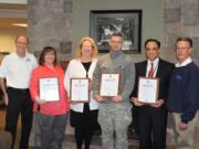 Eagle Rehabilitation at Camas recently made a pledge to support and honor the men and women who are members of the United States military Guard and Reserve.  Representatives from the Employer Support of the Guard and Reserve, a Department of Defense organization, recently visited the local facility to present certificates memorializing this commitment to U.S. troops. The ESGR was established to promote cooperation and understanding between Reserve members and their civilian employers and to assist in the resolution of conflicts arising from an employee's military commitment.  Pictured above are (left to right)  Camas resident Art McCallum, ESGR ombudsman; Sheri Boles, occupational therapist at Eagle Rehabilitation; Diane Backstrom, Eagle Rehabilitation director of nursing; Col. Daniel R. Kern, Washington National Guard; Paul McVay, Eagle Rehabilitation administrator; and Joel F. Scott, ESGR area chair for the Washington Committee.