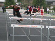 Joe Harris glides to first place in the 110-meter hurdles, with a time of 16.02 seconds, March 20, at Fishback Stadium.