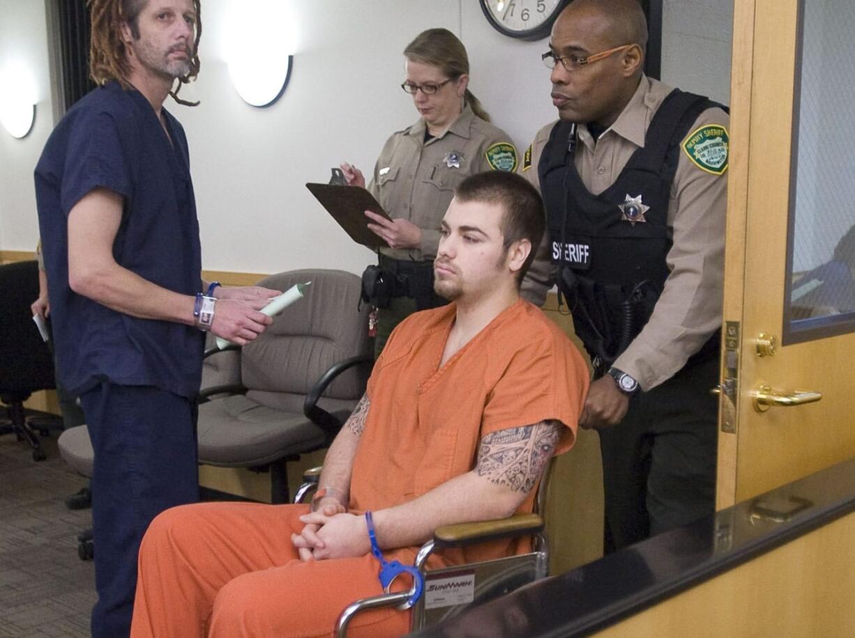 Stephen A. Lubeck, 19, shown here at a court appearance in December, pleaded guilty Friday to robbery, assault and unlawful imprisonment charges.