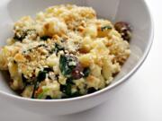 Mushrooms and spinach add nutrition and flavor to a basic mac and cheese.