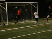 Josiah Pacheco chips in the goal that helps Camas beat Union 2-1.