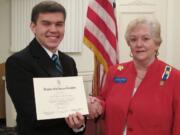 Washougal High School senior David Choi stands with Evelyn Campbell, regent of the Fort Vancouver Chapter of the Daughters of the American Revolution to receive his &quot;Good Citizen Award.&quot;