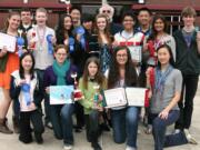 Camas High School students had a good showing at the recent Washington State Science and Engineering Fair finals. They include (bottom row, kneeling left to right) Yushuan Peng, Sophie Shoemaker, fifth-grader Emily Sheppard, Caroline Kealoha and Joanna Liao.; (top row, left to right) Elizabeth Nickerson, Aaron Deml, Kyle Binder, Camille Ritter, Jonathan Liao, Rachel Fadlovich, advisor Ron Wright, Reesab Pathak, Jonathan Ho, Meghal Sheth and Jackson Merle.