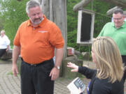 Washougal Mayor Sean Guard gets weighed in, as Fat 2 Fit NW Executive Director Michelle Clark and Camas Mayor Scott Higgins look on, during the May 2 kickoff of the &quot;Camas and Washougal on a Diet&quot; challenge. Since then, Guard has lost 7.5 pounds, while Higgins has lost 9 pounds. &quot;It is going well,&quot; Higgins said Monday.