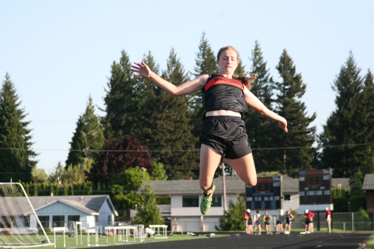 Washougal High School senior Katie Wright's final jump at Fishback Stadium was for a personal best distance of 16 feet, 10 inches.