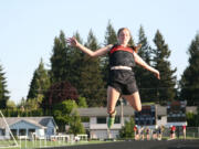 Washougal High School senior Katie Wright's final jump at Fishback Stadium was for a personal best distance of 16 feet, 10 inches.