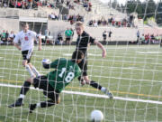 Camas senior Adam Allison outwits the goalkeeper with a header into the back of the net Wednesday, at Doc Harris Stadium. The Papermakers defeated Bishop Blanchet 1-0 in the first round of the state tournament. Camas (16-2) faces Mountain View in the quarterfinals Saturday, at Doc Harris.