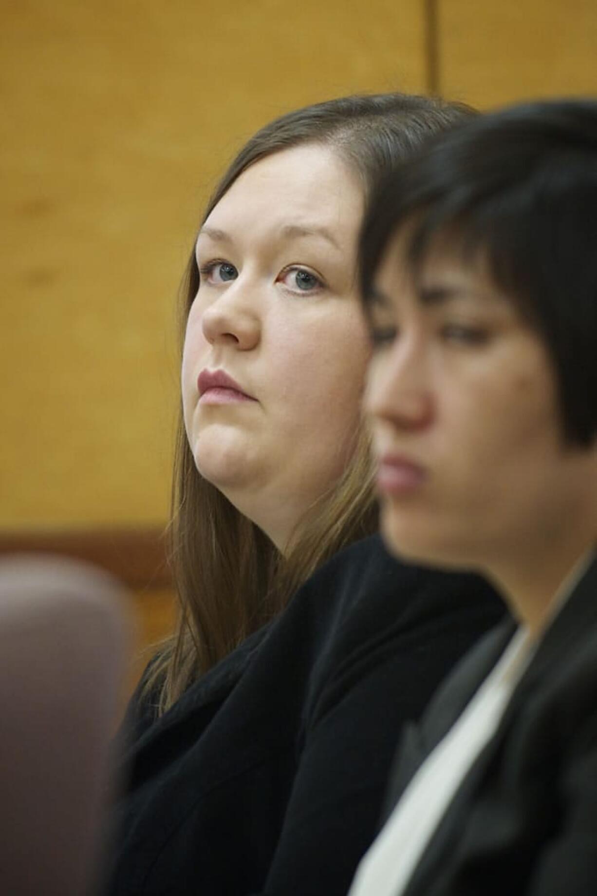 Alayna Higdon, pictured here during opening statements of her trial, is charged with imprisoning her boyfriend's two autistic sons last year.