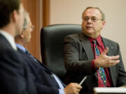 Clark County Commissioner Tom Mielke, right, takes part in a county hearing meeting in  2009.