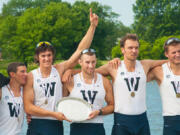 Reiner Hershaw (fourth from left) holds a piece of the IRA Open Four National Championship trophy. The 22-year-old, who graduated from Washougal High School in 2008, was recently commissioned to the U.S.