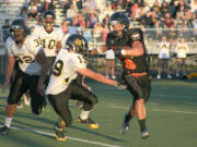 Sam O'Hara (3) makes his way into the end zone for the Washougal football team Friday, at Fishback Stadium.