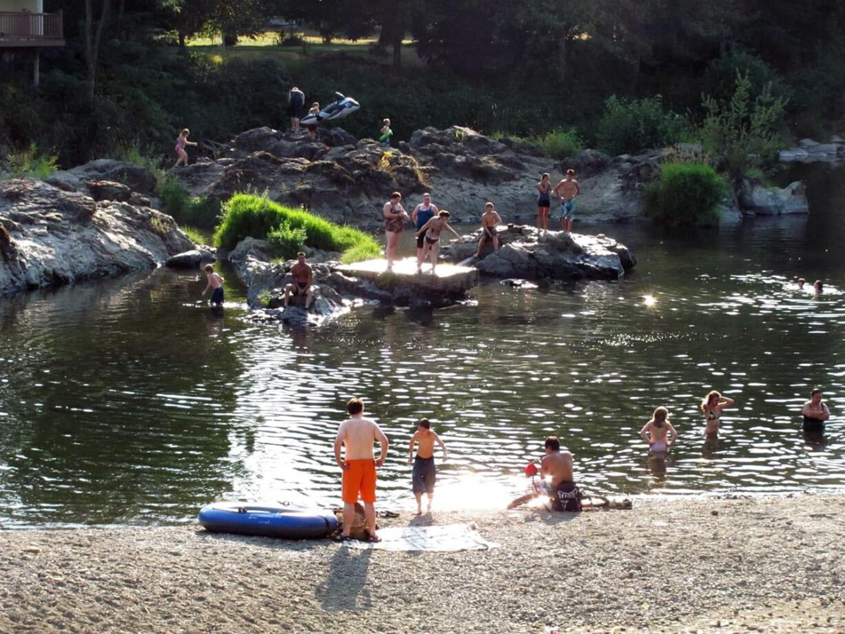 Floating, tanning and jumping off rocks into the water were all popular activities at the Sandy Swimming Hole last week.