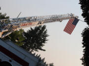 Camas Fire Department engines blocked off Northeast Fourth Avenue, between Everett and Franklin streets on Sunday morning, as a remembrance event in commemoration of the Sept.