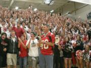 KATU News anchor Carl Click is surrounded by more than 200 screaming Camas Papermakers during Friday night's High School Blitz broadcast.