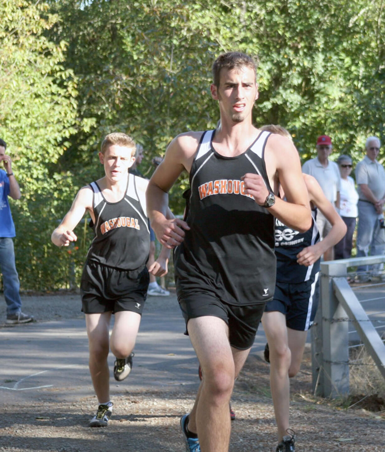 Washougal runners Noah Collins (front) and Geer McGee (left) finished in the top four with Sean Eustis and Isaac Stinchfield Thursday, at Lake Sacajawea Park.