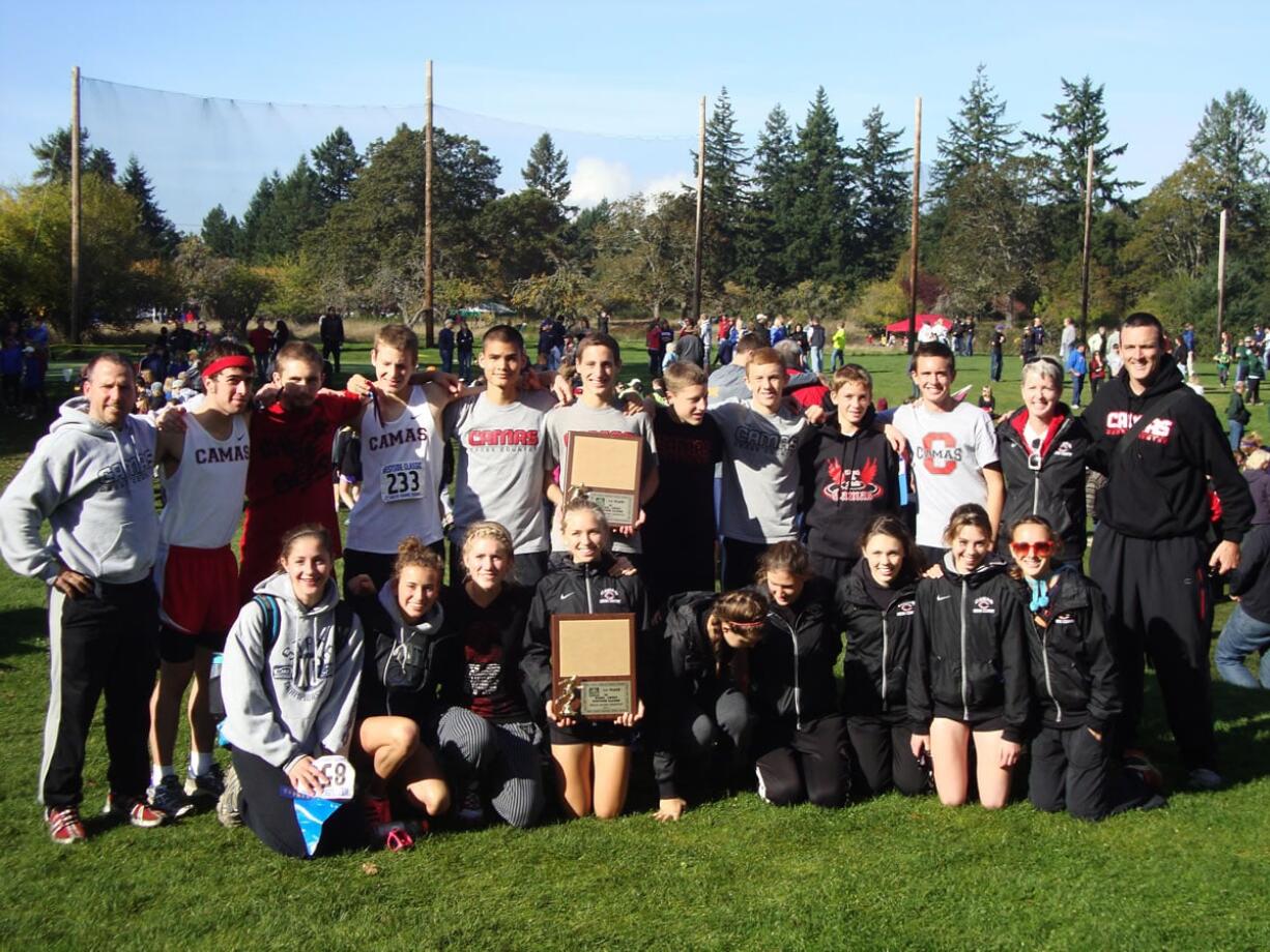 The Camas cross country teams captured bi-district championship trophies from the Westside Classic Saturday, at American Lake in Tacoma.