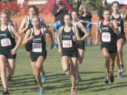 The Camas girls cross country runners get ready to run the race of a lifetime at the 3A state meet Saturday, in Pasco.