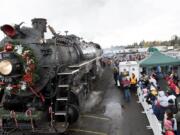 The SP&amp;S 700 steam locomotive brings Santa Claus to the Vancouver Amtrak station during its most recent visit in 2008. The locomotive -- and Santa -- return at 11 a.m.