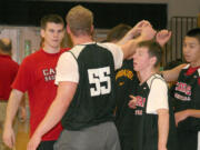 New Camas High School boys basketball coach Skyler Gillispie (left) is excited to lead the Papermakers into the future.