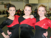 Camas High School gymnasts Hali Ramirez, Hayden Sutton and Audrey Siebenthaler (left to right) are building a lifelong friendship through athletics.