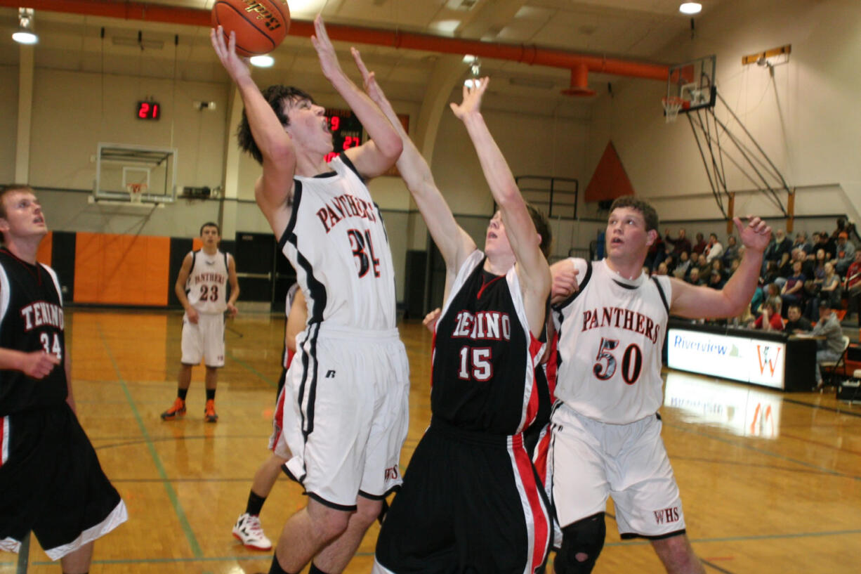 Aaron Diester roars on the way to the hoop Wednesday, at Washougal High School.