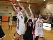 Aaron Diester roars on the way to the hoop Wednesday, at Washougal High School.