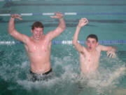 Washougal High School swimmers Nathan Milojevic (left) and Geer McGee (right) jumped at the opportunity to represent their school in swimming.