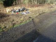 Oregon State Patrol and Oregon Department of Transportation officials investigate a crash on Oregon Highway 20 west of Philomath.