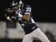 Jabari Marshall, 33, of Skyview High School intercepts a pass in a game against Issaquah High School at Kiggins Bowl Friday November 4, 2011 in Vancouver, Washington.