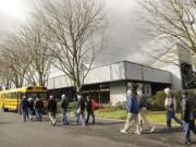 Visitors board a bus for a tour of the Port of Vancouver on Thursday.