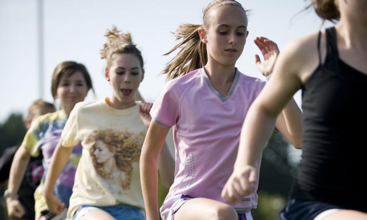 Alexa Efraimson works out with her Camas girls cross country team.