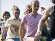 Alexa Efraimson works out with her Camas girls cross country team.