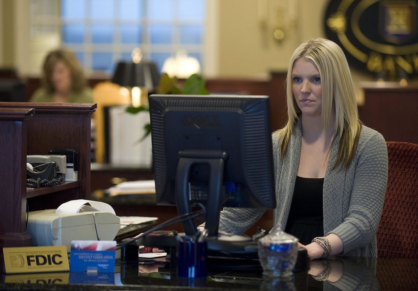 &quot;American Idol&quot; contestant Britnee Kellogg, who was eliminated from the competition on Thursday night's broadcast, was at work Friday at Regents Bank in Vancouver.