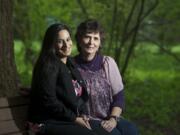 Carol Springer and her daughter Tiffany, 27, pose for a portrait at Orchards Park on Friday. Springer is being honored for years of service as a foster parent.