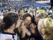 The Skyview girls celebrate after winning the 4A Girls State Basketball Tournament in Tacoma, Saturday, March 3, 2012 Skyview beat Central Valley 46-43.