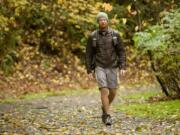 Kevin DeGraw of Vancouver, 32, who has hiked the Appalachian Trail, the Pacific Crest Trail and the Continental Divide Trail in the past four years, takes on the Cougar Creek Trail in Vancouver last week.