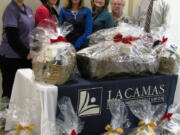 Camas: Lacamas Community Credit Union donated 20 holiday dinner baskets to members as part of its Community Partnership program.