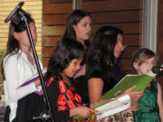 Fircrest: The Firstenburg Girls Choir performed at the Loaves and Fishes Christmas Brunch on Dec. 23. Back row from left are Elin Bertheau and Caprial Nead.