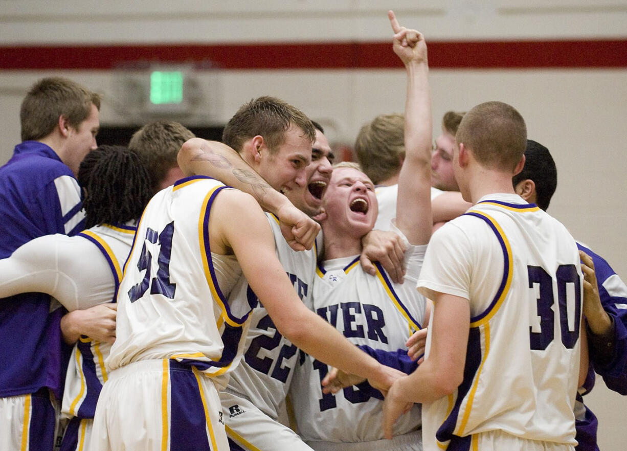 Columbia River celebrates after beating Mt. View to win the GSHL 3A District Basketball Tournament at Fort Vancouver High School, Friday, February 10, 2012.