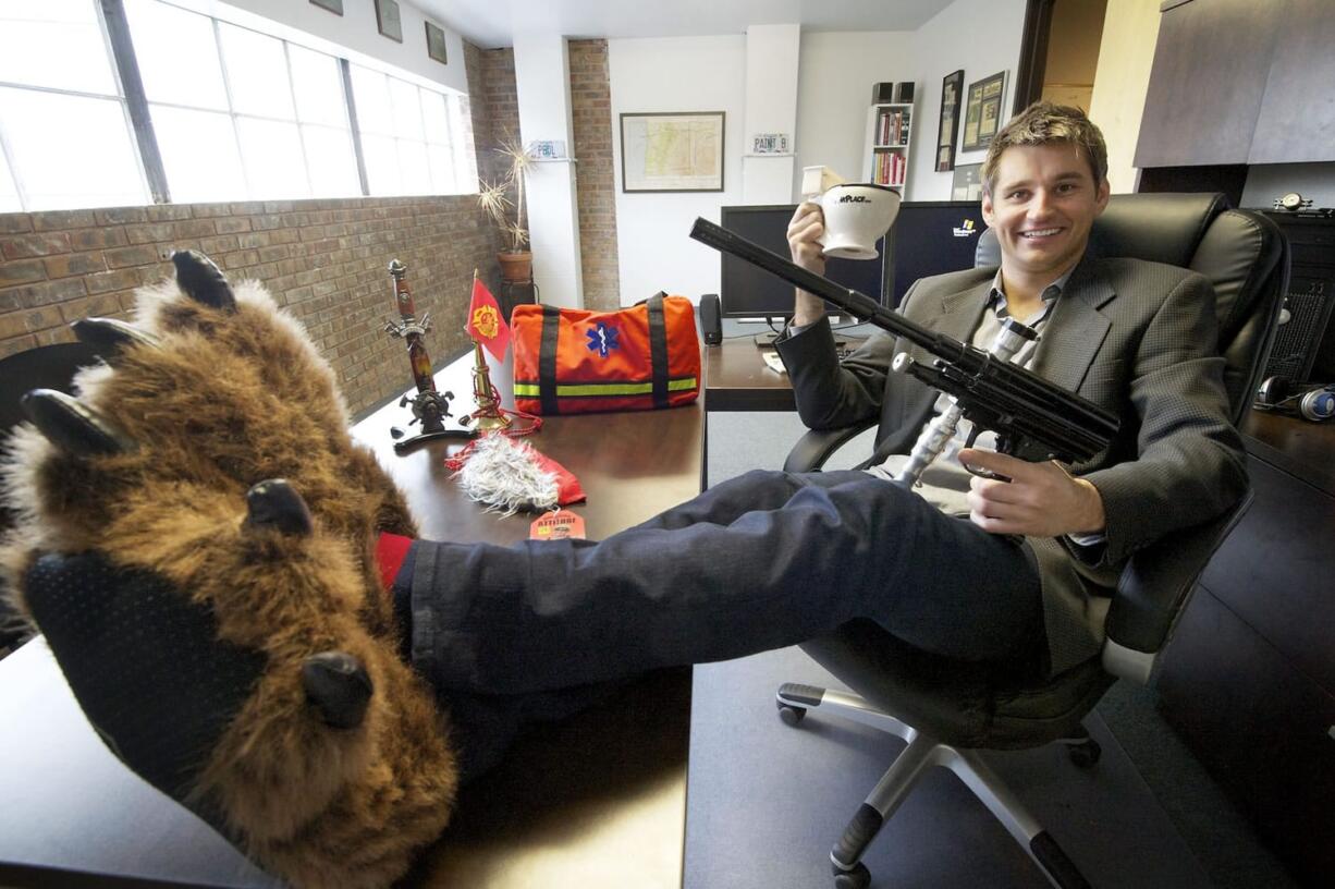 Adam Stites, president and CEO of iStores, shows off some of his product lines at his Vancouver office.