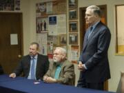 Gov. Jay Inslee, right, listens to questions from members of the Labor Round Table on Wednesday at the Laborers International Union hall in Vancouver.