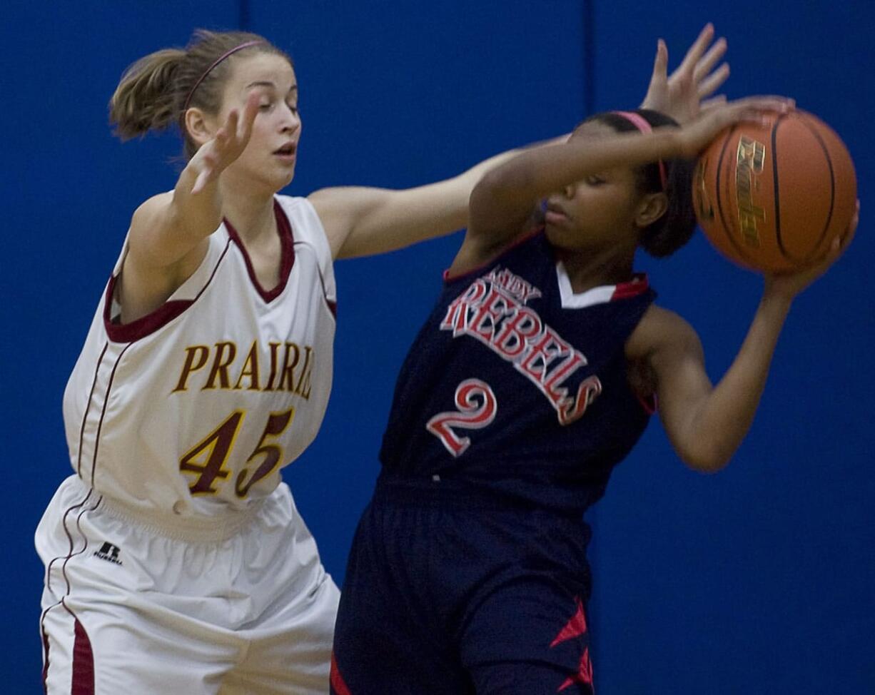 Prairie's Jackie Lanz (45) applies defensive pressure on Juanita's Mikayla Jones during Saturday's Class 3A regional playoff game.