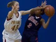 Prairie's Jackie Lanz (45) applies defensive pressure on Juanita's Mikayla Jones during Saturday's Class 3A regional playoff game.