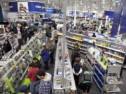 Crowds bustled through Best Buy's store in Vancouver in 2010.