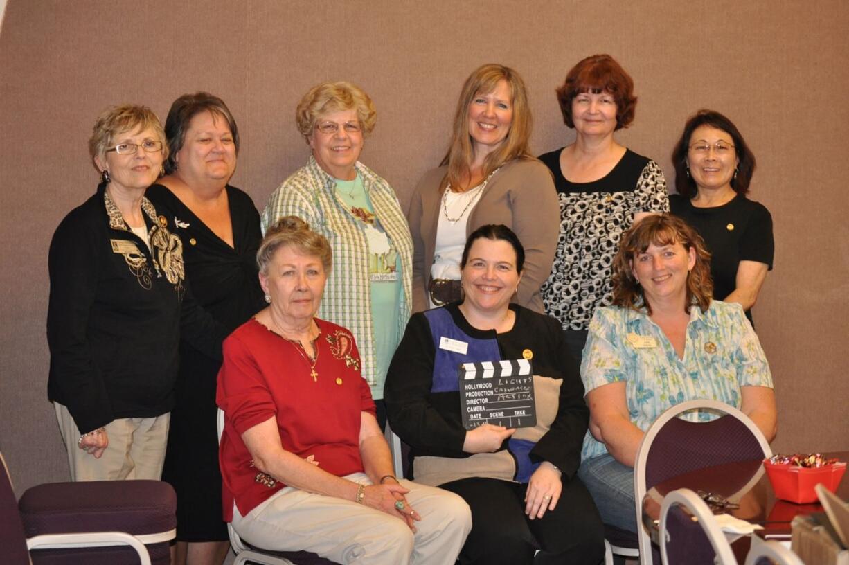 Carene Davis-Stitt, far left, of the national Soroptimist board of directors, welcomed new directors of Soroptimist International Southwest Washington.