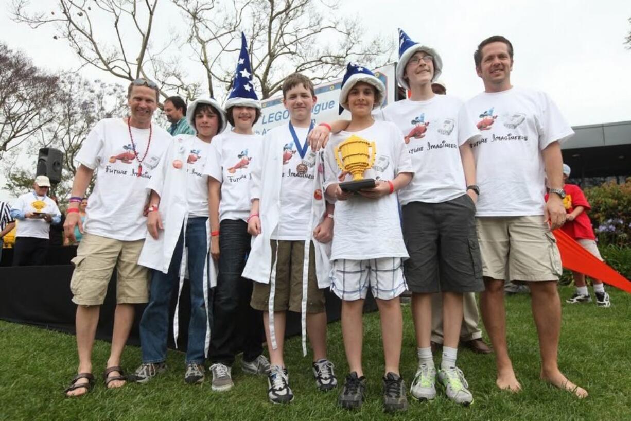 Camas: The Future Imagineers robotics team -- Coach Bob Croucher, from left, Jonah Runde, Tyler Croucher, Seamus McAvoy, Yuness Badiei, Bryce Croucher and coach Randy Croucher -- took first place in Mechanical Design at the National FIRST Lego League Robotics Tournament.