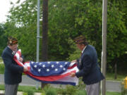 Salmon Creek: Richard Alvarez, left, and Ron Frisbee from the Veterans of Foreign Wars performed a flag-raising ceremony at ManorCare Health Service's new facility in Salmon Creek.