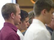 North Clark County teenagers from left, Riley Munger, Mitchell Kangas and Jaren Koistinen make an appearance in court earlier this year.